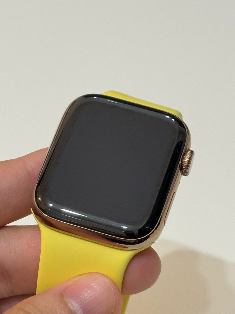 Gold apple watch with cheap yellow band