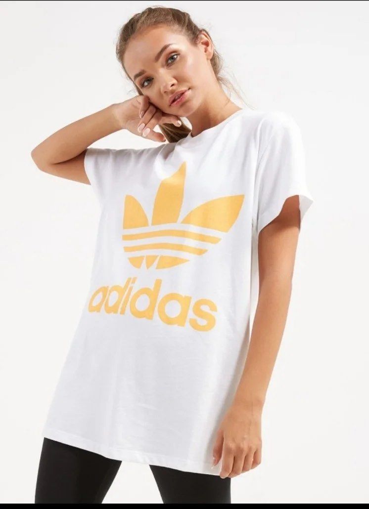 White and orange adidas shirt top
