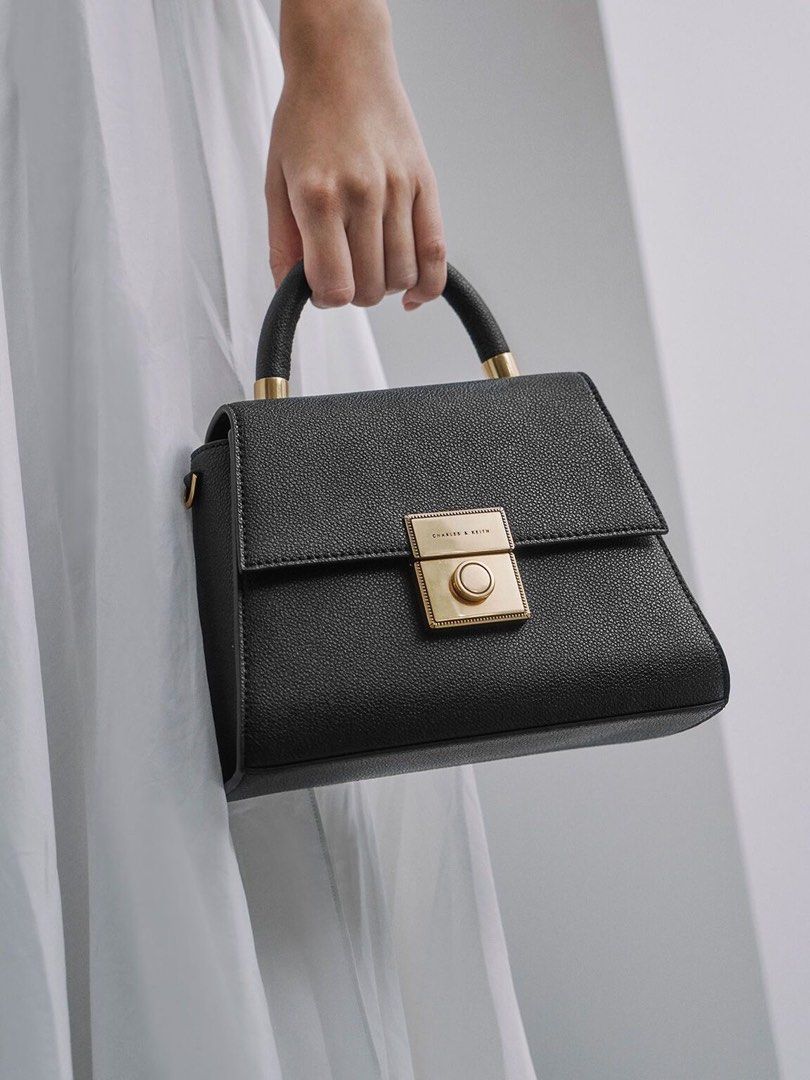 Trapeze top handle bag clearance