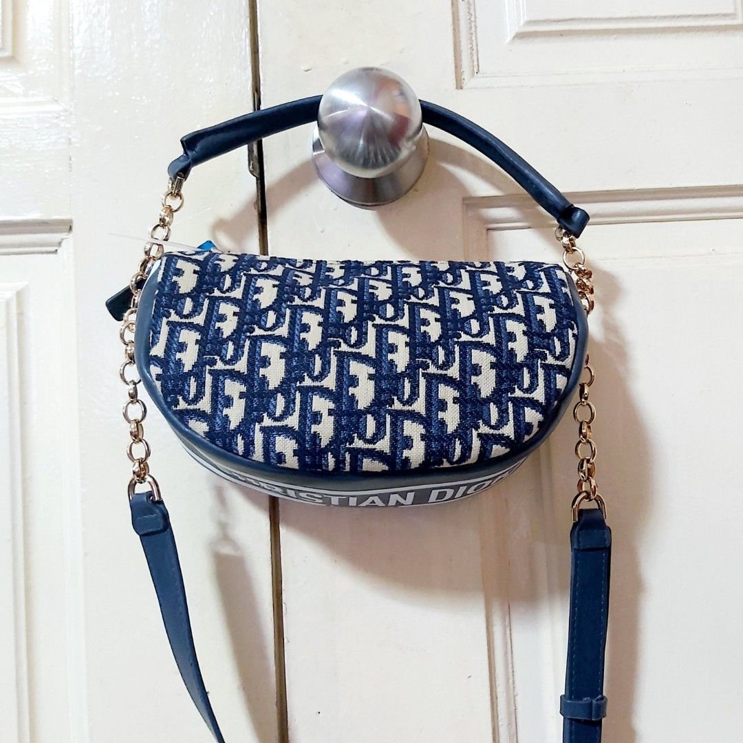 Christian Dior pouch bag, Luxury, Bags & Wallets on Carousell