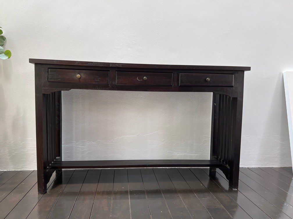 Console table (Category: Shelves, Cabinets & Racks) located in Singapore. Submitted by rblez (Listing ID 1261361536, Image 1). Description: Ca 120cm x 40cm, dark brown wood, first to pickup can have it.