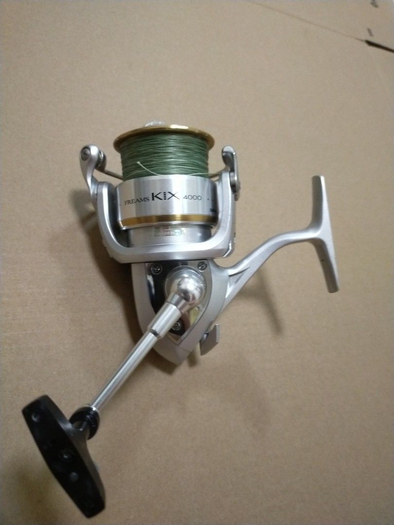 Daiwa Freams kix 4000 fishing reel with rod, Sports