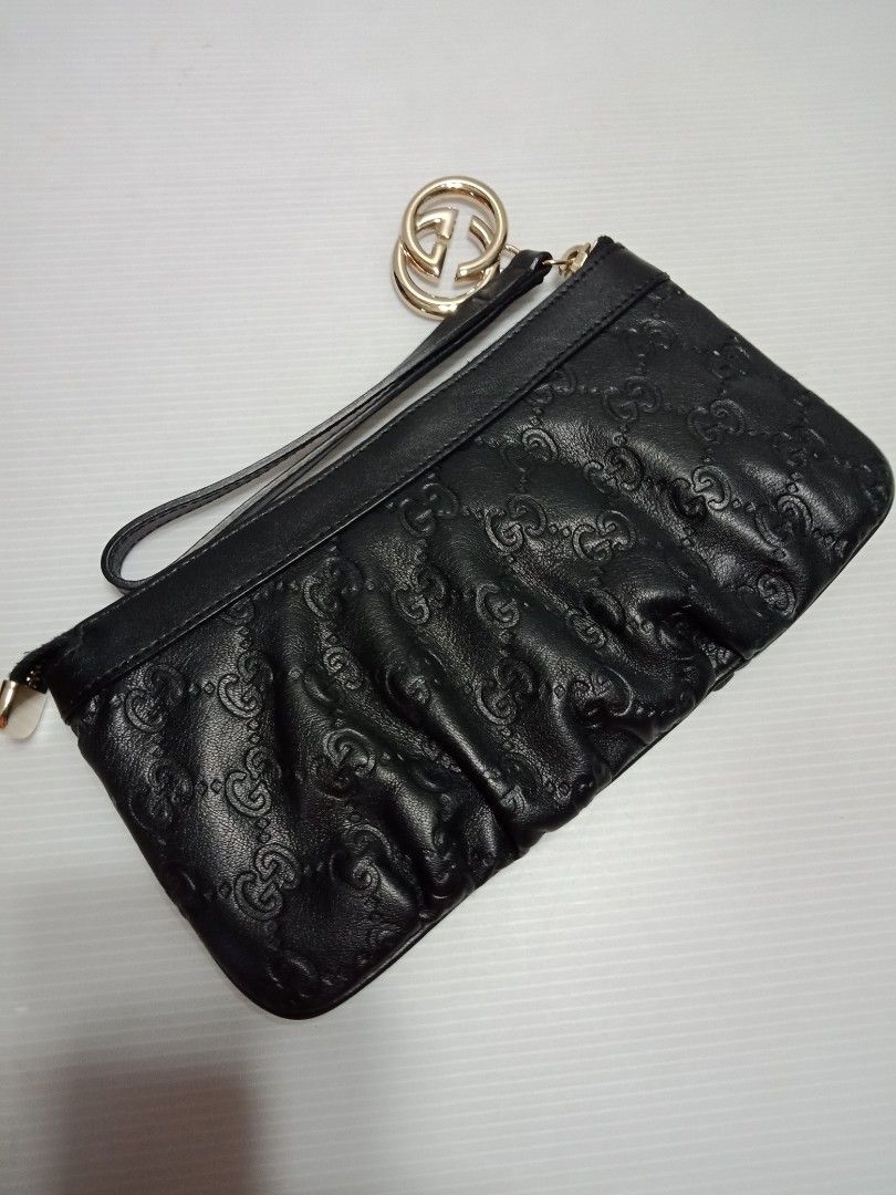 Gucci on sale wristlet black