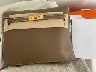 Hermès Kelly Pochette Clutch Bag in Terre Cuite Ostrich and Palladium  Hardware, Size 22 cm