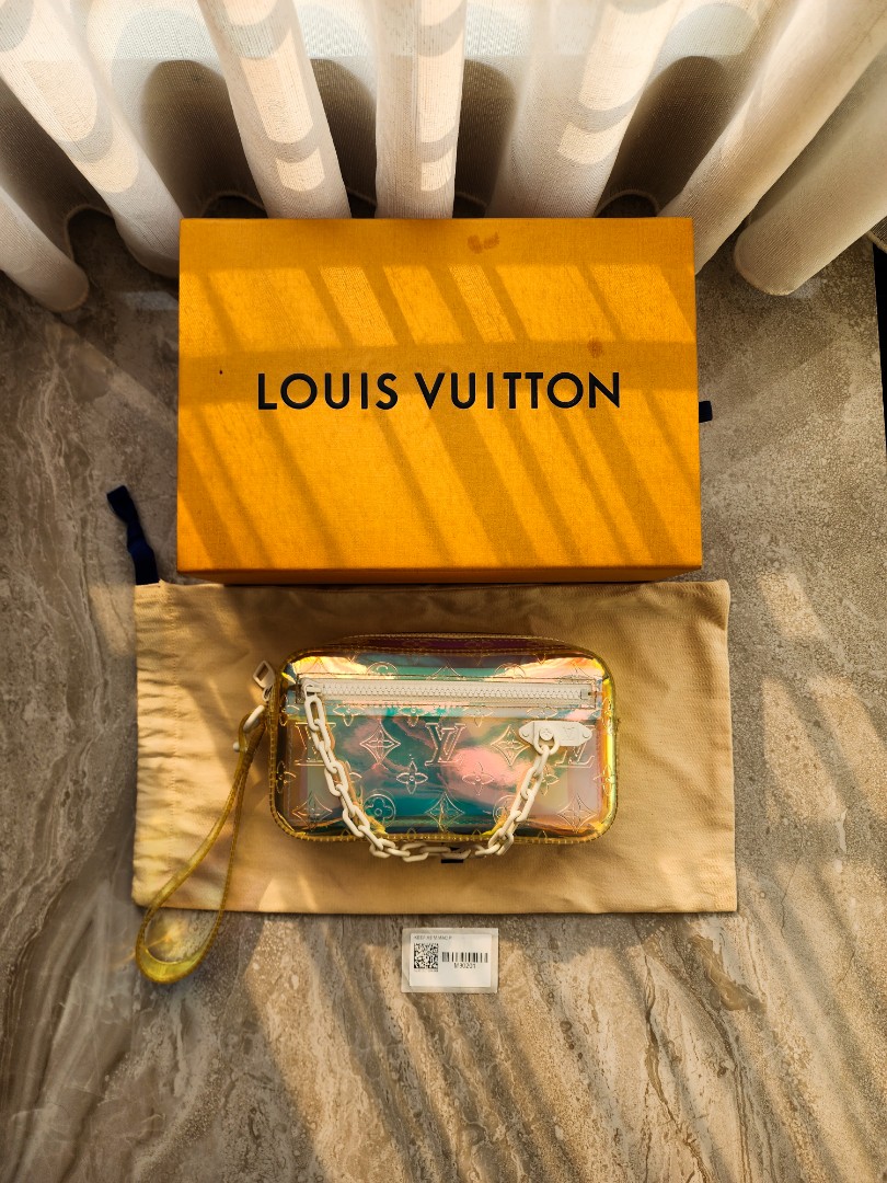 Louis Vuitton Pochette Volga Limited Edition Monogram Prism PVC