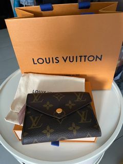 Singapore - SEP 11, 2016: a Louis Vuitton Wallet Standing . Louis Vuitton  is a Luxury Designer Brand. Editorial Photo - Image of object, 2016louis:  86304266