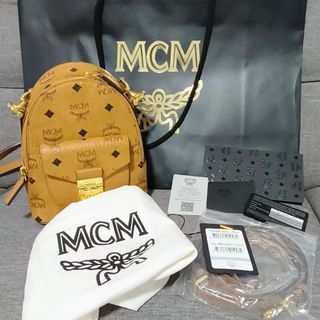 Authentic MCM Backpack ( Look at the receipt and if its fake i will hold  full legal resonsibilty )