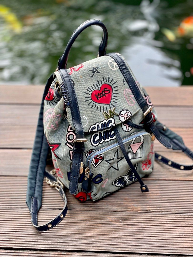 Michael michael kors beacon 2025 small embroidered denim backpack