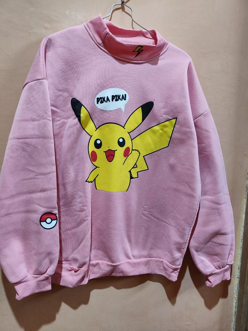 Sweater pink pikachu Fesyen Wanita Pakaian Wanita Atasan di Carousell