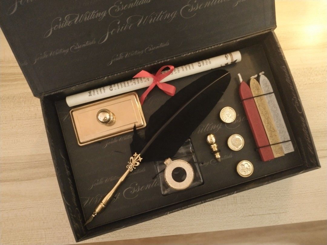Vintage Scribe Quill Calligraphy Box Set (Category: Stationery & School Supplies) located in Pasig City. Submitted by visodette (Listing ID 1261377520, Image 1). Description: Scribe Quill Calligraphy Gift Box ✒️🪶🖤 ❕ EXCLUSIVE & AUTHENTIC ❕ Vintage Scribe PH Giftbox (2015) ✨ "Brand new" I have never used it once, HOWEVER, it is very old. Only flaw is the ink bottle has a broken cap. See last slides for details. Box Set Includes: • 1 Quill Callig