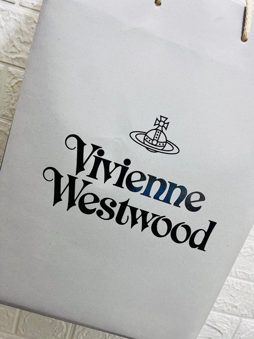 VIVIENNE WESTWOOD - Exclusive Chelsea logo-embossed leather clutch