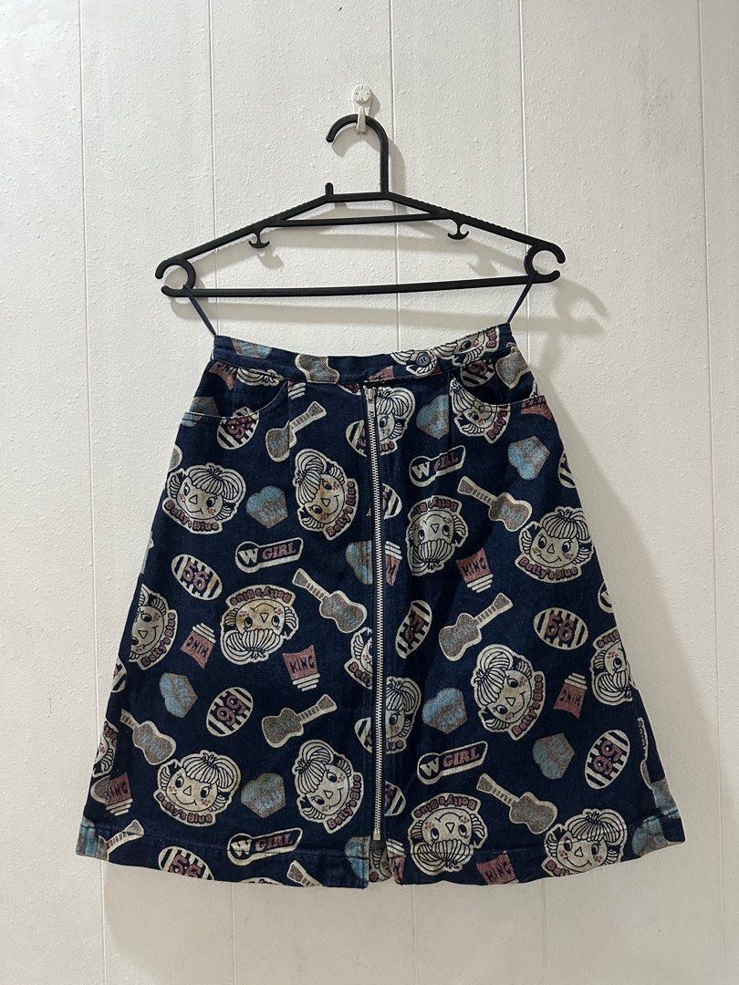 Y2K Graphic Denim Skirt (Category: Skirts) located in Marikina City. Submitted by retailr (Listing ID 1261434107, Image 1). Description: Adorable graphic denim skirt made for your Y2K style~ complete with pockets!! Size: XS-S Condition Well-used Some stain marks that come with used denim, but looks just like it’s part of the style (see photos) .