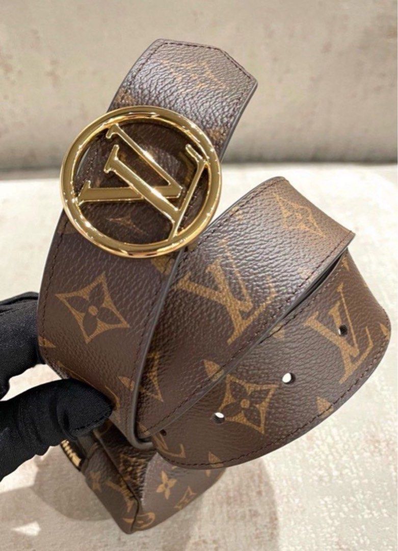 Brown and gold Lv belt, worn once has a extra hole