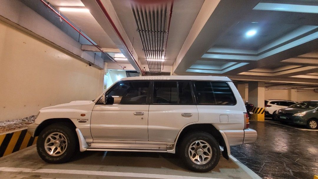 Mitsubishi Pajero FN Auto (Category: Used Cars) located in Makati City. Submitted by jtacs (Listing ID 1261638268, Image 2). Description: Very presentable- TOP 3% on the roads! (Slightly Neg upon viewing) Complete original equipment/ Tools New Bridgestone AT DuellerTires Good Paint Aircon Vents Bnew Original Good sound system w High-end Bluetooth Pioneer Head Unit Bright Led Headlamps Well-mained by Mitsubishi Motorix All Original with spare part