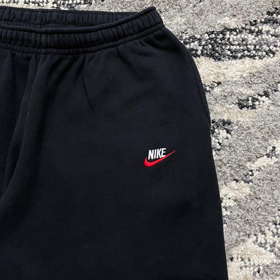 Red tick deals nike joggers