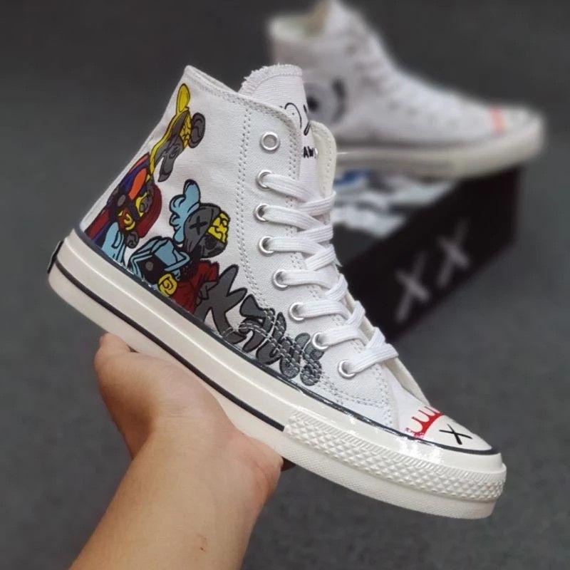 Converse x deals kaws harga