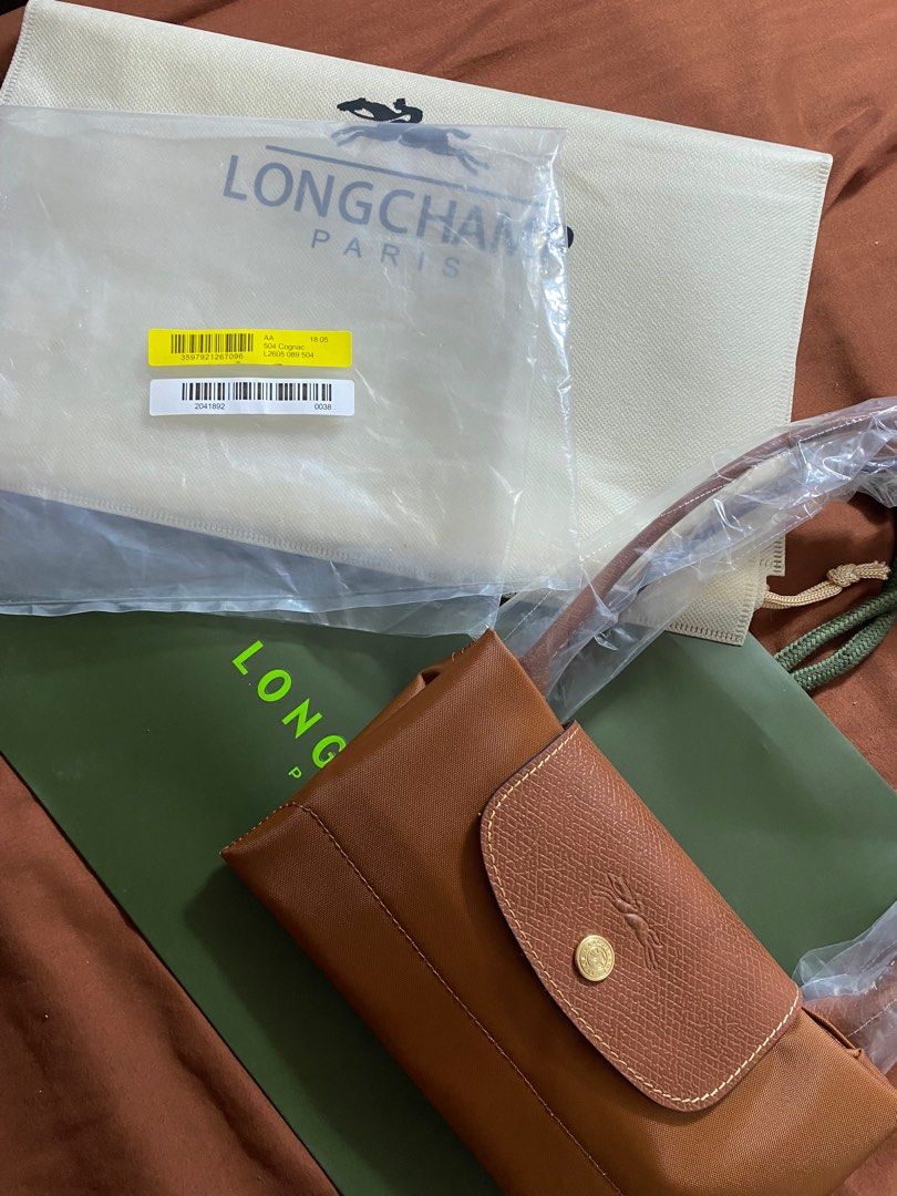 Longchamp Le Pliage Pouch with Handle in Cognac, Luxury, Bags & Wallets on  Carousell