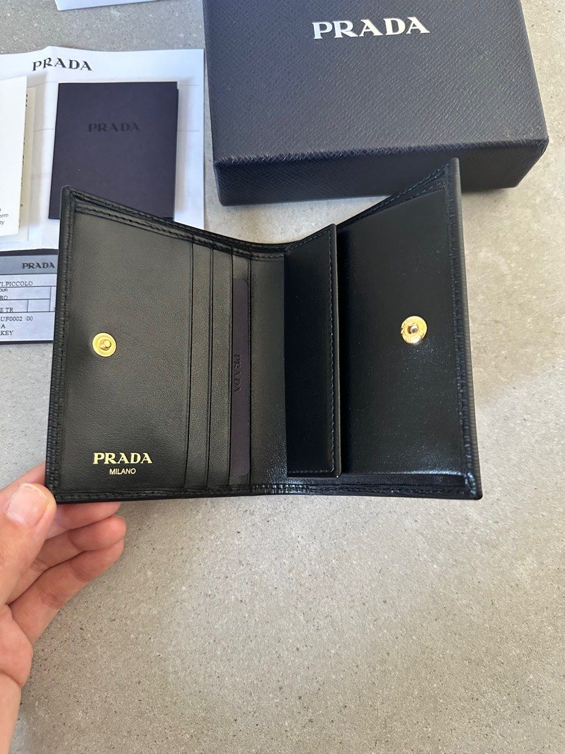 Sold at Auction: Prada - Key Holder Wallet - Tan - Saffiano Leather - Gold  hardware