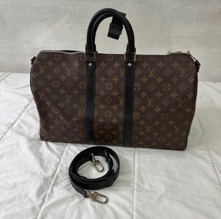 Louis Vuitton Keepall Bandouliere 55 brass hardware, cleaned with Brasso
