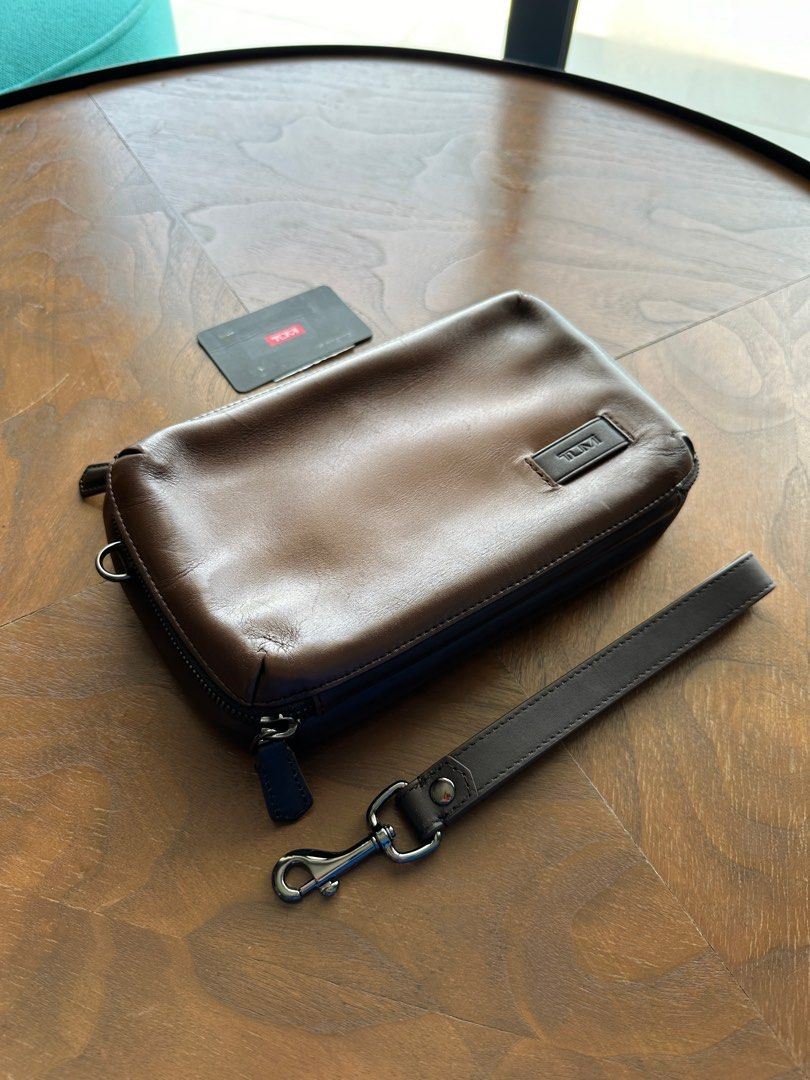 Tumi nassau triple zip clutch outlet