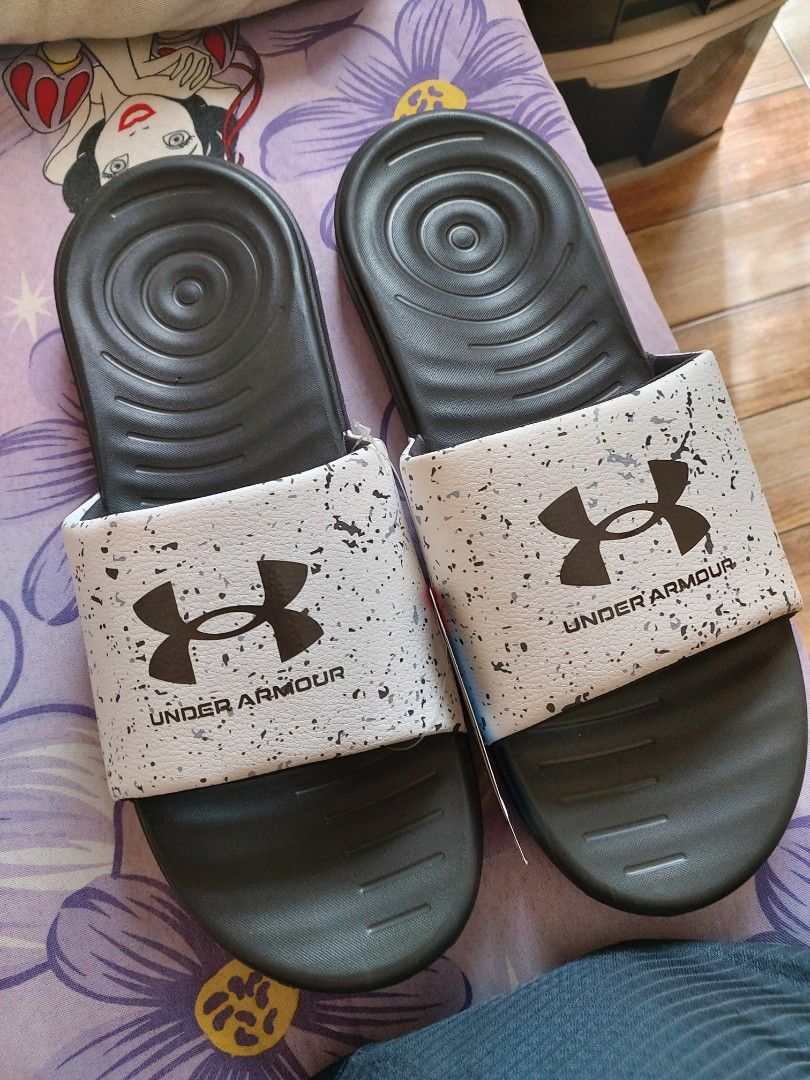 Under Armour Slides (Category: Slippers & Slides) located in Pasig City. Submitted by borjong (Listing ID 1261569188, Image 1). Description: Under Armour Slides size 14US brand new.