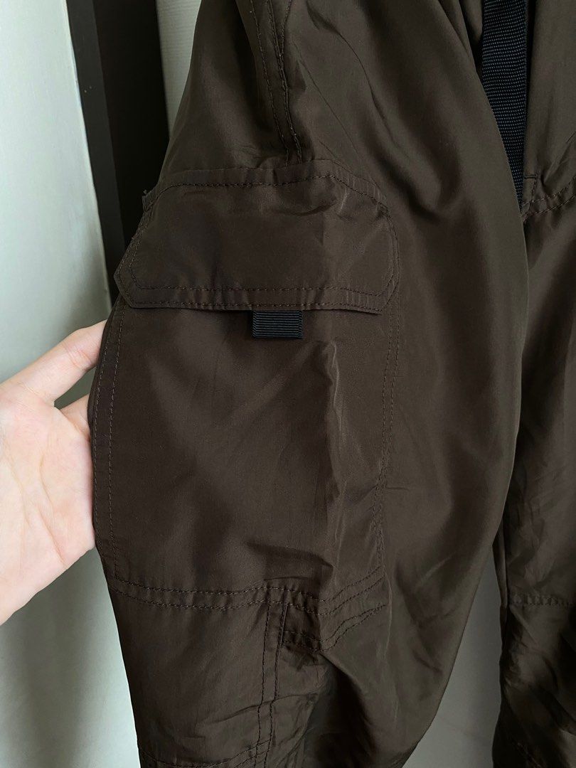 Uniqlo parachute cargo pants (Category: Other Bottoms) located in Guagua. Submitted by caifits (Listing ID 1261597965, Image 2). Description: Uniqlo parachute cargo pants - S on tag (68-76cm) // 24-34 (measured laid flat) -fits 24 (when cinched) to 34 (max. stretch) - see 2nd-4th photos to see the actual color - warm lined (super comfy, buttery feels) - built-in belt - can be worn as low waist, mid-waist or high-waist - very flattering -unisex 80