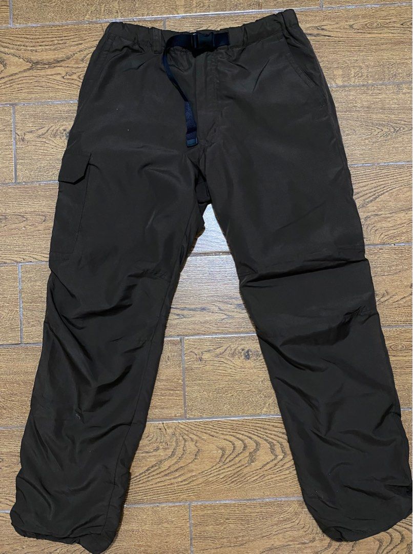 Uniqlo parachute cargo pants (Category: Other Bottoms) located in Guagua. Submitted by caifits (Listing ID 1261597965, Image 1). Description: Uniqlo parachute cargo pants - S on tag (68-76cm) // 24-34 (measured laid flat) -fits 24 (when cinched) to 34 (max. stretch) - see 2nd-4th photos to see the actual color - warm lined (super comfy, buttery feels) - built-in belt - can be worn as low waist, mid-waist or high-waist - very flattering -unisex 80