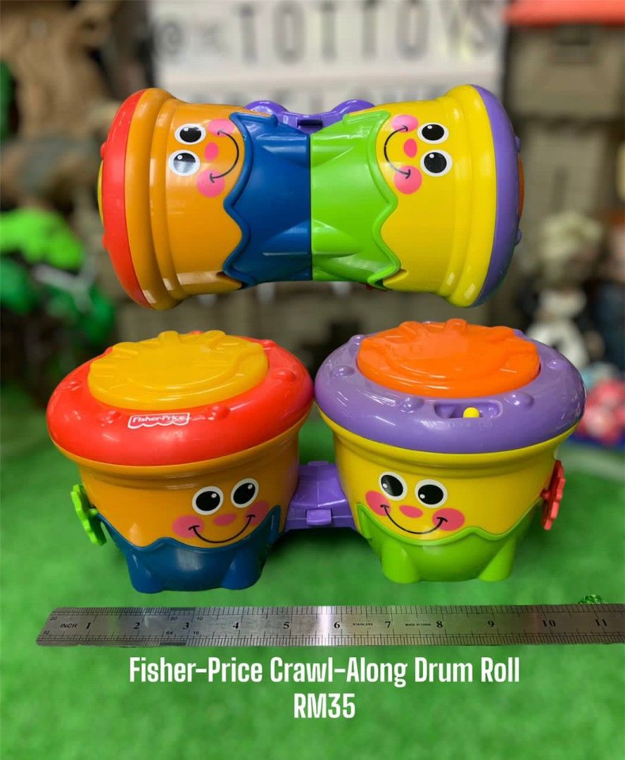 Fisher price sale crawl along drum