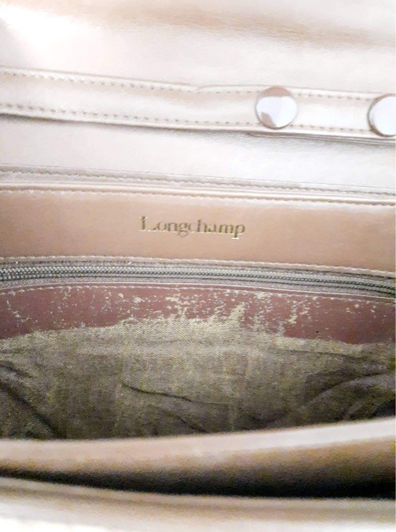 Longchamp Vintage Clutch / Sling bag (Category: Luxury Bags & Wallets) located in Cavite. Submitted by tin09y (Listing ID 1261801428, Image 3). Description: Super nice vintage bag (can be used as clutch or cross body. Flaw: expired leather lining. But overall super nice pa for a vintage bag..