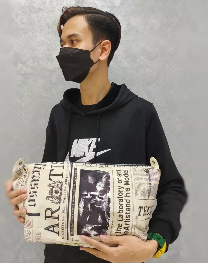 Newspaper online clutch bag