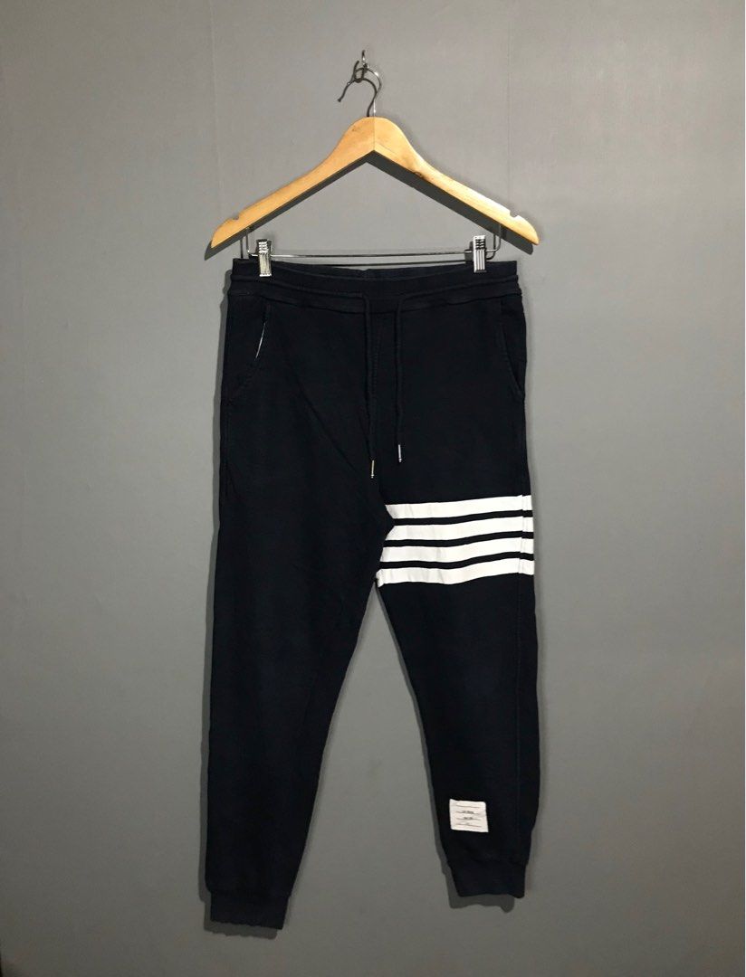 Thom Browne Loopback Knit Engineered 4-Bar Sweatpants Navy (Category: Joggers) located in Santa Cruz. Submitted by hongkongmarketph (Listing ID 1261876401, Image 3). Description: Thom Browne Loopback Knit Engineered 4-Bar Sweatpants Navy excellent condition 9/10 color rate Authentic Size 1 on tag Waist 30-36 Length 41 .