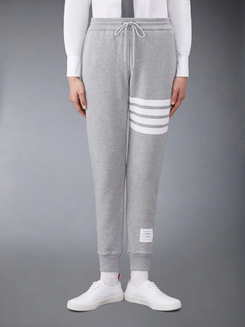 Thom Browne Loopback Knit Engineered 4-Bar Sweatpants In Gray (Category: Joggers) located in Santa Cruz. Submitted by hongkongmarketph (Listing ID 1261876950, Image 1). Description: Thom Browne Loopback Knit Engineered 4-Bar Sweatpants In Gray excellent to new condition authentic size 4 on tag waist 32-38 length 41 .