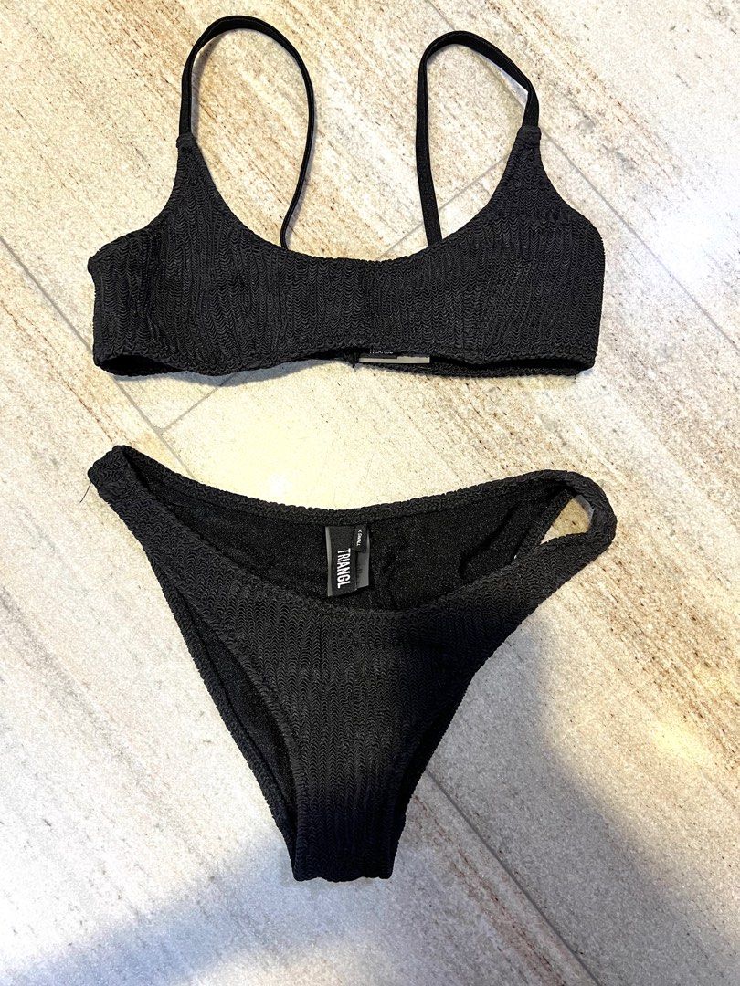Triangl Bikini Set black in XS (Category: Bikinis & Swimsuits) located in Singapore. Submitted by slosells (Listing ID 1261776444, Image 1). Description: Worn only once. 95 good condition. .