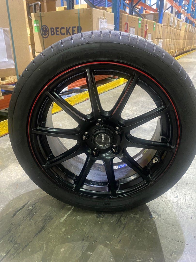 17” Rays 57transcend (Category: New Rims) located in Singapore. Submitted by johnnytan84 (Listing ID 1259141014, Image 3). Description: 17” rays 57transcend black with red outline. 5x114.3 with used tyre(need change) Item ready out of car. Open for nego. And please like my post 😂..