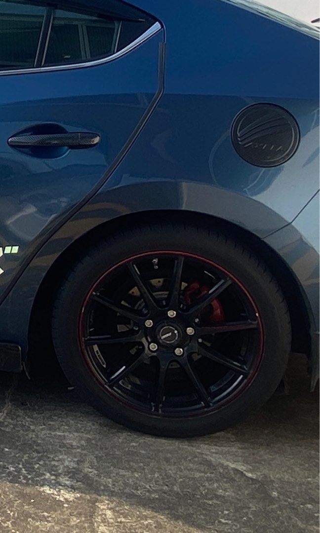 17” Rays 57transcend (Category: New Rims) located in Singapore. Submitted by johnnytan84 (Listing ID 1259141014, Image 2). Description: 17” rays 57transcend black with red outline. 5x114.3 with used tyre(need change) Item ready out of car. Open for nego. And please like my post 😂..