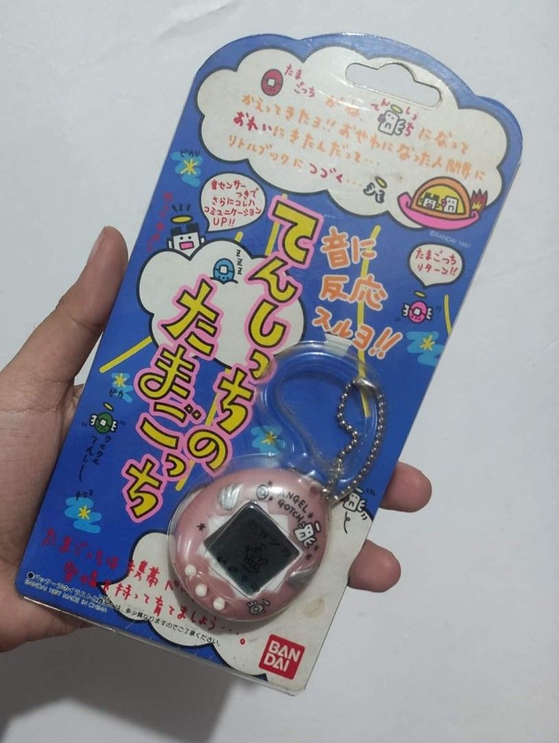 1997 ANGELGOTCHI TAMAGOTCHI, Hobbies & Toys, Toys & Games on Carousell