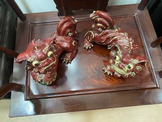 A pair of Chinese shiwan lions.