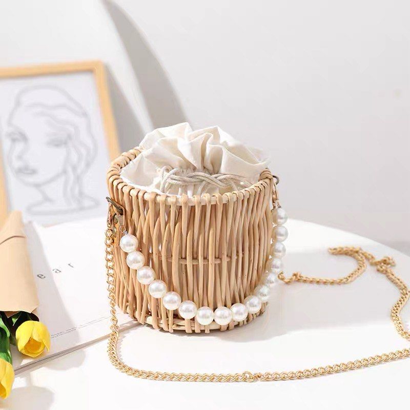 Basket bag with store faux pearl handles
