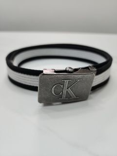 Calvin Klein Men's Casual CK Monogram Cut Out Buckle Belt at  Men’s  Clothing store
