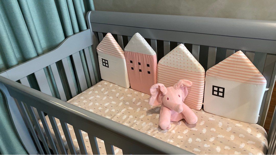 Crib Bumper (Pink) very thick! (Category: Bed Guards) located in Quezon City. Submitted by thelazyloft (Listing ID 1262019194, Image 2). Description: Crib Bumper (Pink) - includes 4 houses that can be hooked on to each other - with garterized bumper ties to stay fastened to the crib rails - with removable cotton covers - very thick! - total dimensions: 120x50x5cm - made for cribs sized 28x52” - Brand New, vacuum sealed, never opened Php1,400 (Ori