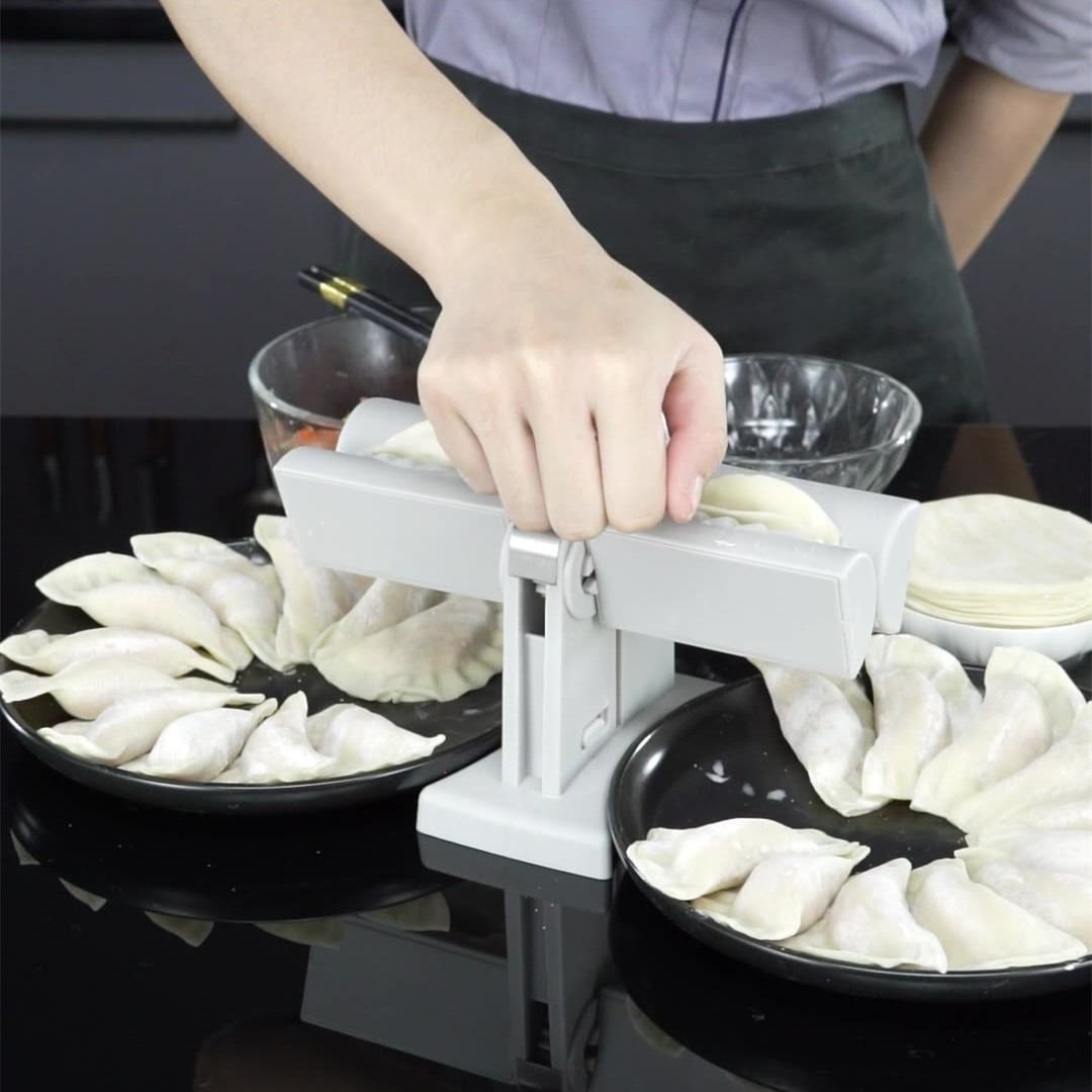Dumpling Maker (Category: Other Kitchenware & Tableware) located in Singapore. Submitted by taylm (Listing ID 1262036154, Image 3). Description: Make your favourite dumplings from home. Create dumplings that are consistent in size and shape, which allows them to cook evenly. Also, save time and effort as you don't have to fold each dumpling into the shape. Size: 17*20*12cm (7*8*5in) Weight: 0.35kg (0.77lb) Meetup at my place. For delivery, buyer 
