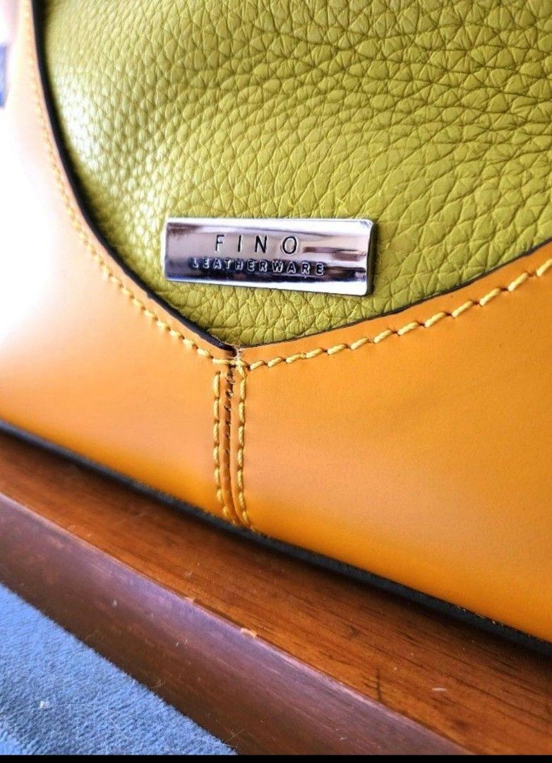 Fino Leather 2-way bag (Category: Luxury Bags & Wallets) located in Pasig City. Submitted by yourgotobag (Listing ID 1261975657, Image 2). Description: never been used..