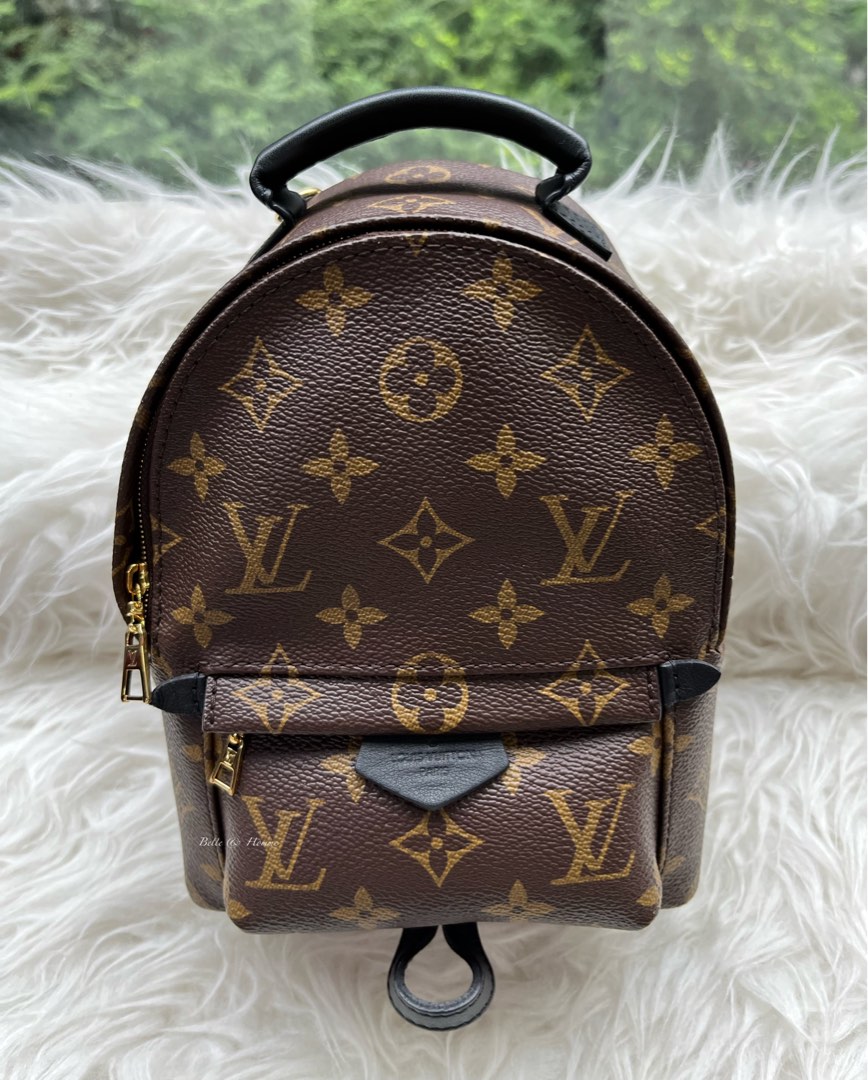 Used louis vuitton mini backpack discount