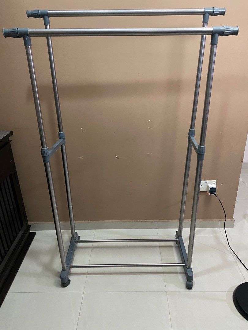 Extendable stainless steel cloth rack with locking wheels, Furniture