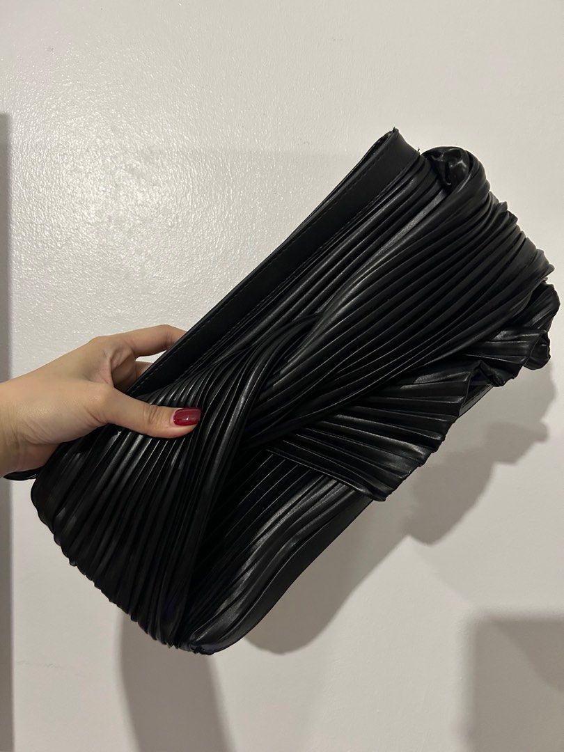 Shein pleated clutch (Category: Clutches) located in Marikina City. Submitted by mpaurf (Listing ID 1262085857, Image 1). Description: Shein pleated clutch used once only in a wedding. Super nice! Spacious in the inside. Loc: Marikina.