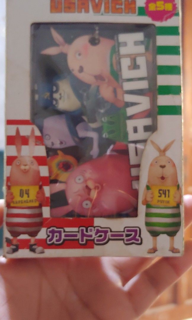 Usavich Card Case and Key Ring (Category: Character Goods) located in San Miguel. Submitted by lianna_andrea (Listing ID 1261979824, Image 3). Description: natago lang na key ring and card case pero new po ito from Japan. Usavich (Japanese: ウサビッチ; Russian: Усавич) is a series of short animated comedy made by MTV Japan. The series is created by Kanaban Graphics. There are 13 episodes in each season, and each episodes last 90 seconds; there are six