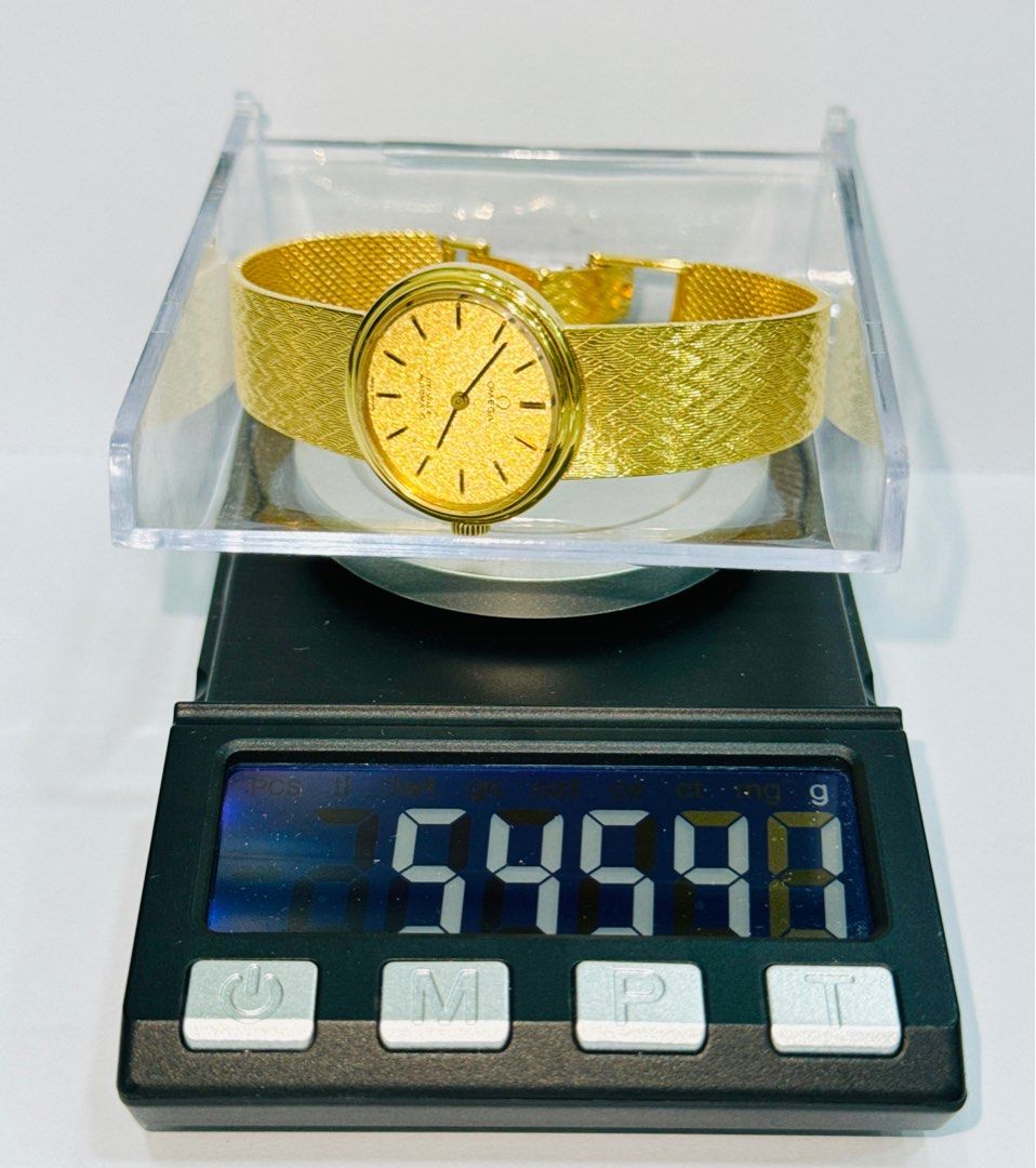 omega solid gold watch