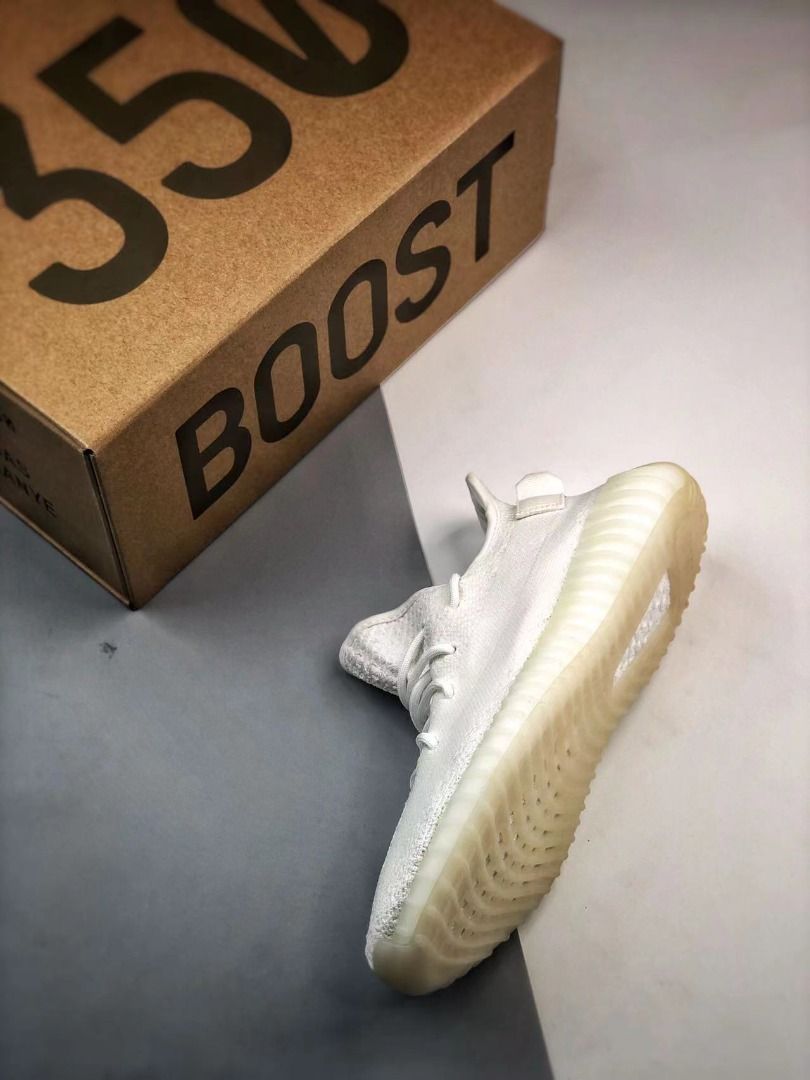 Yeezy supply triple white shipping hotsell