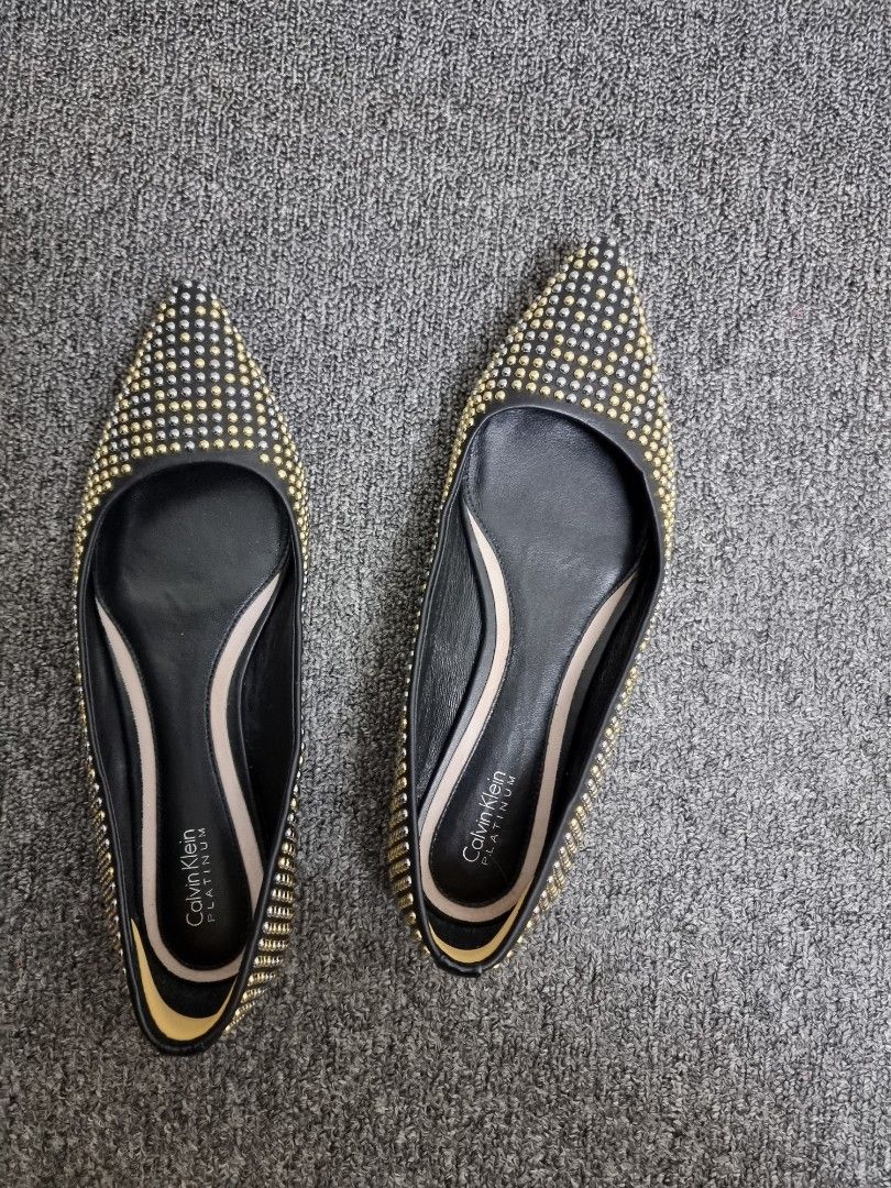 Gold calvin hotsell klein shoes
