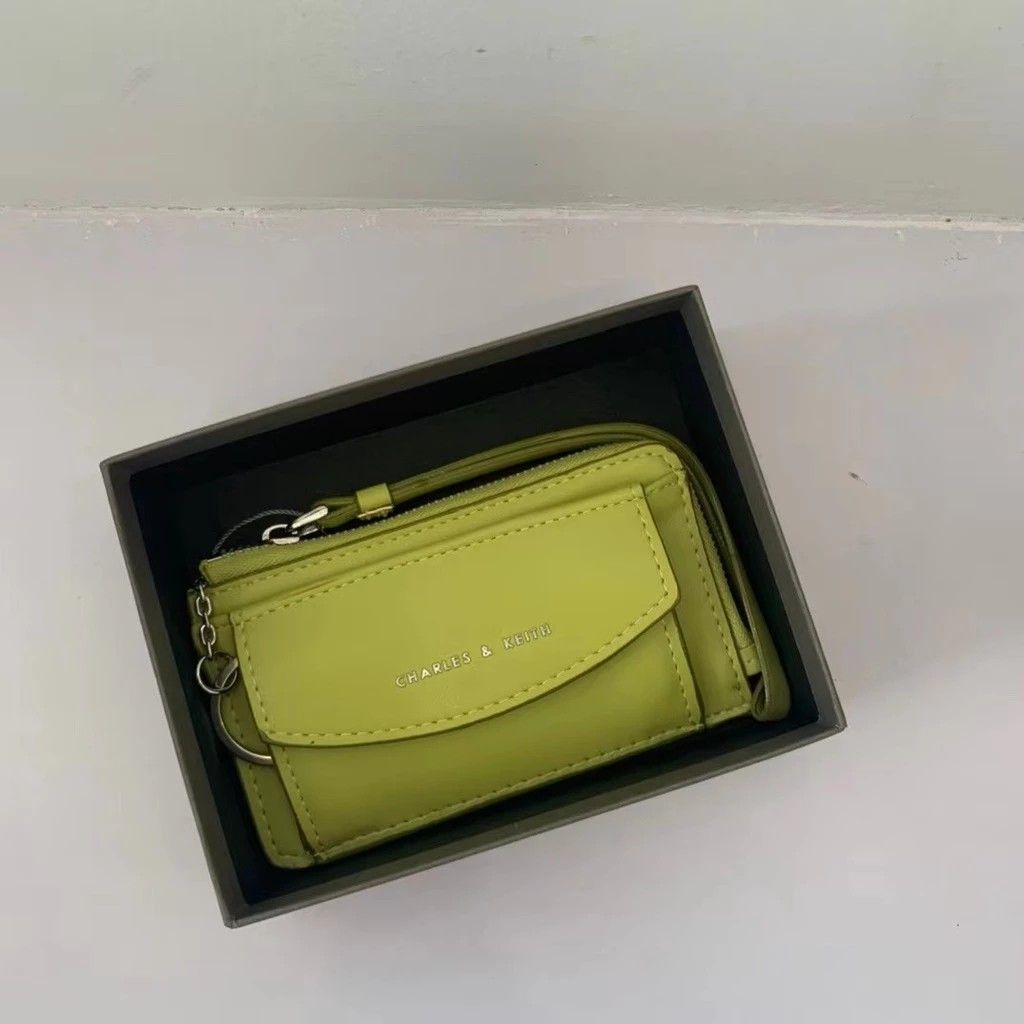 Charles & Keith long wallet, Women's Fashion, Bags & Wallets, Purses &  Pouches on Carousell